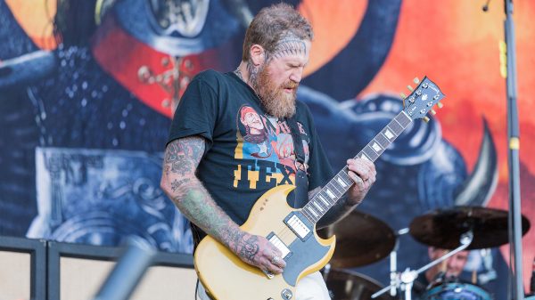 A photo of Brent Hinds playing with Mastodon.