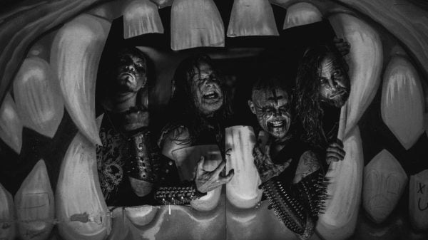 Promotional photo of death metal band Nunslaughter, featuring all members posed together ahead of their upcoming album release
