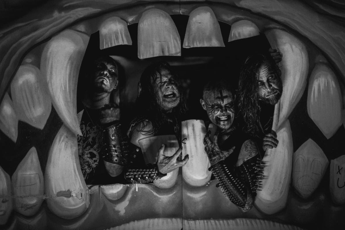 Promotional photo of death metal band Nunslaughter, featuring all members posed together ahead of their upcoming album release