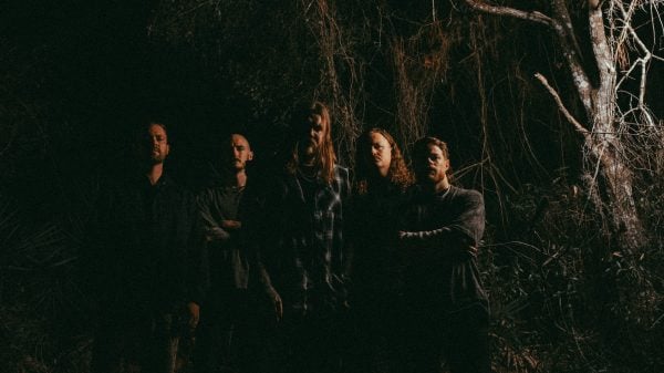 Promotional studio photo of metalcore band Wage War, featuring all band members posed together