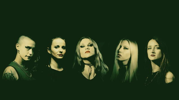 Promotional posed photo of the all-female thrash metal band Nervosa, featuring Prika Amaral (vocals, guitars), Helena Kotina (guitars), Hel Pyre (bass), Emmelie Herwegh (bass), and Michaela Naydenova (drums).